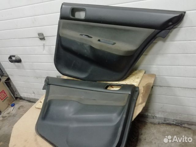 Обшивки дверные Mitsubishi Lancer 1.3 мт 2005 седа