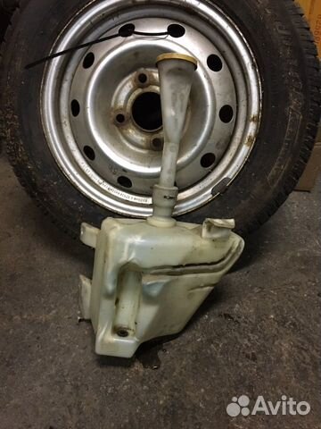 Бачок омывателя Nissan Primera P12 Бачок омывателя Nissan Primera P12