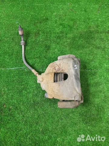 Суппорт тормозной передний левый Ford Focus DA3