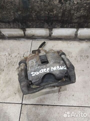 Суппорт передний левый Renault Duster