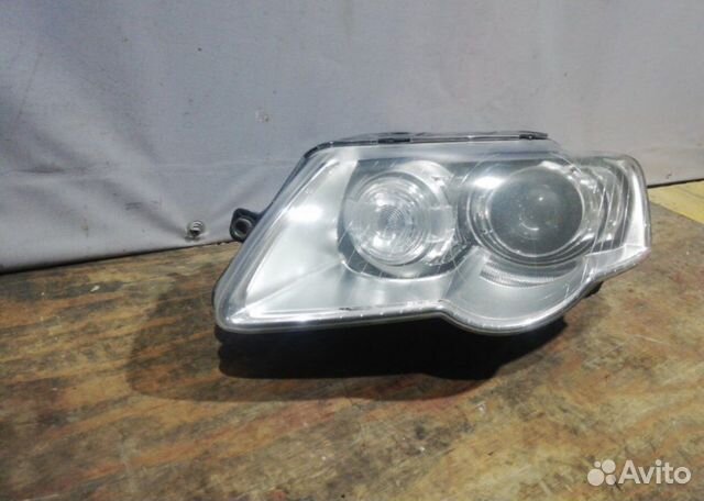 Фара передняя левая Volkswagen Passat B6