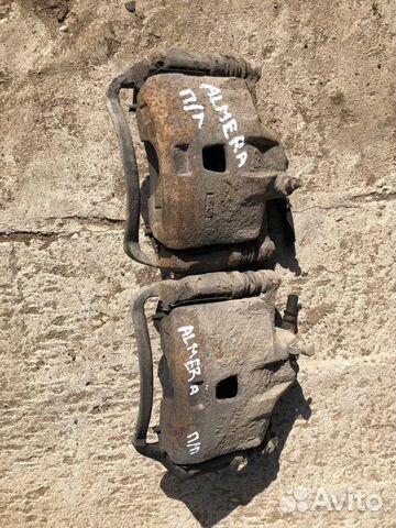 Суппорт передний левый Nissan Almera Classic b10