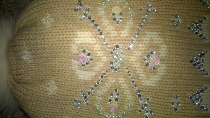 Очень красивая шапкаTavitta