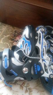 Роликовые коньки