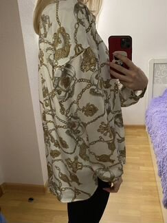 Блузка с цепями