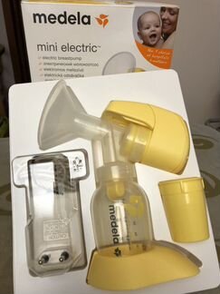 Молокоотсос Medela + сумка с контейнерами